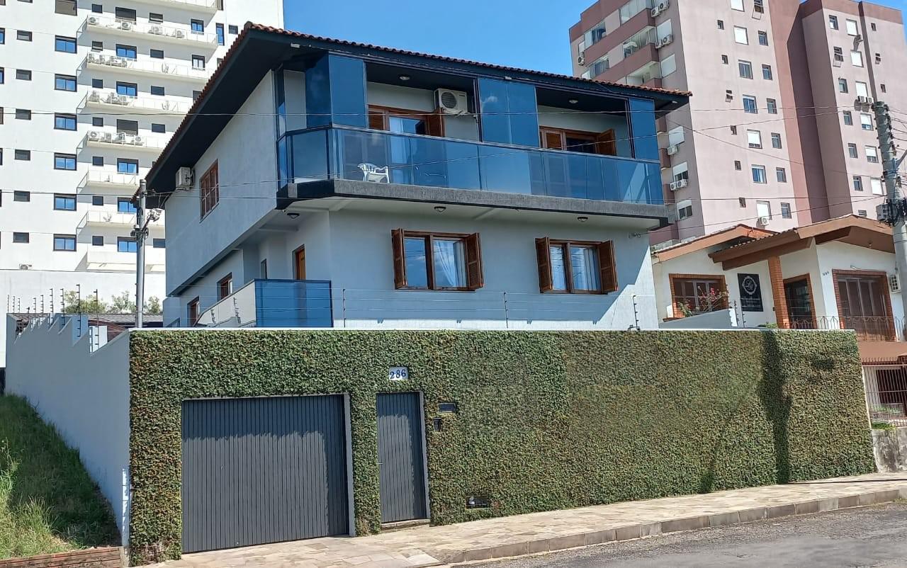 Casa 4 Dormitórios em Passo Fundo — Lorenzato Imóveis